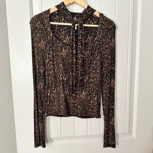 Free People Wild Thing Top animal print shirt women’s size xsmall NWT